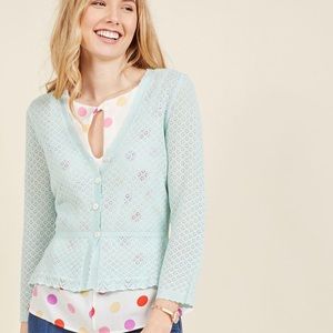 Eyelet cardigan with peplum detail